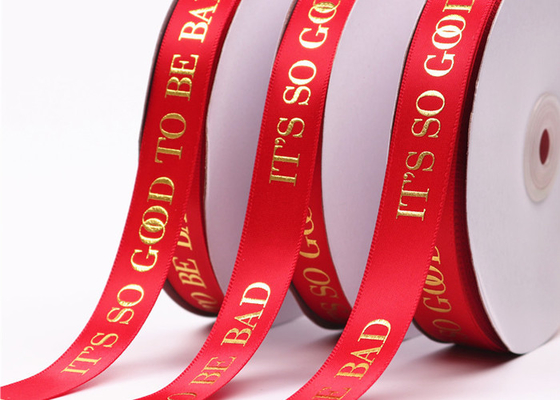 Harga yang bagus Polyester Kustom Dicetak Pita Satin Ramah Lingkungan Dengan Logo Foil Emas on line